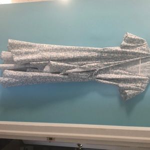 Light blue wrapped dress with Daisy